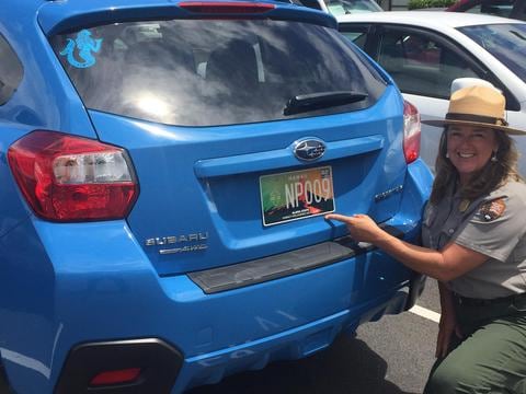 hvnp_centennial_coordinator_jessica_ferracane_shows_off_new_plates.jpg